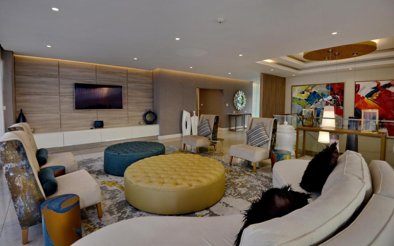 The Houghton Hotel, Spa, Wellness & Golf Joanesburgo Exterior foto A living room in a luxury apartment