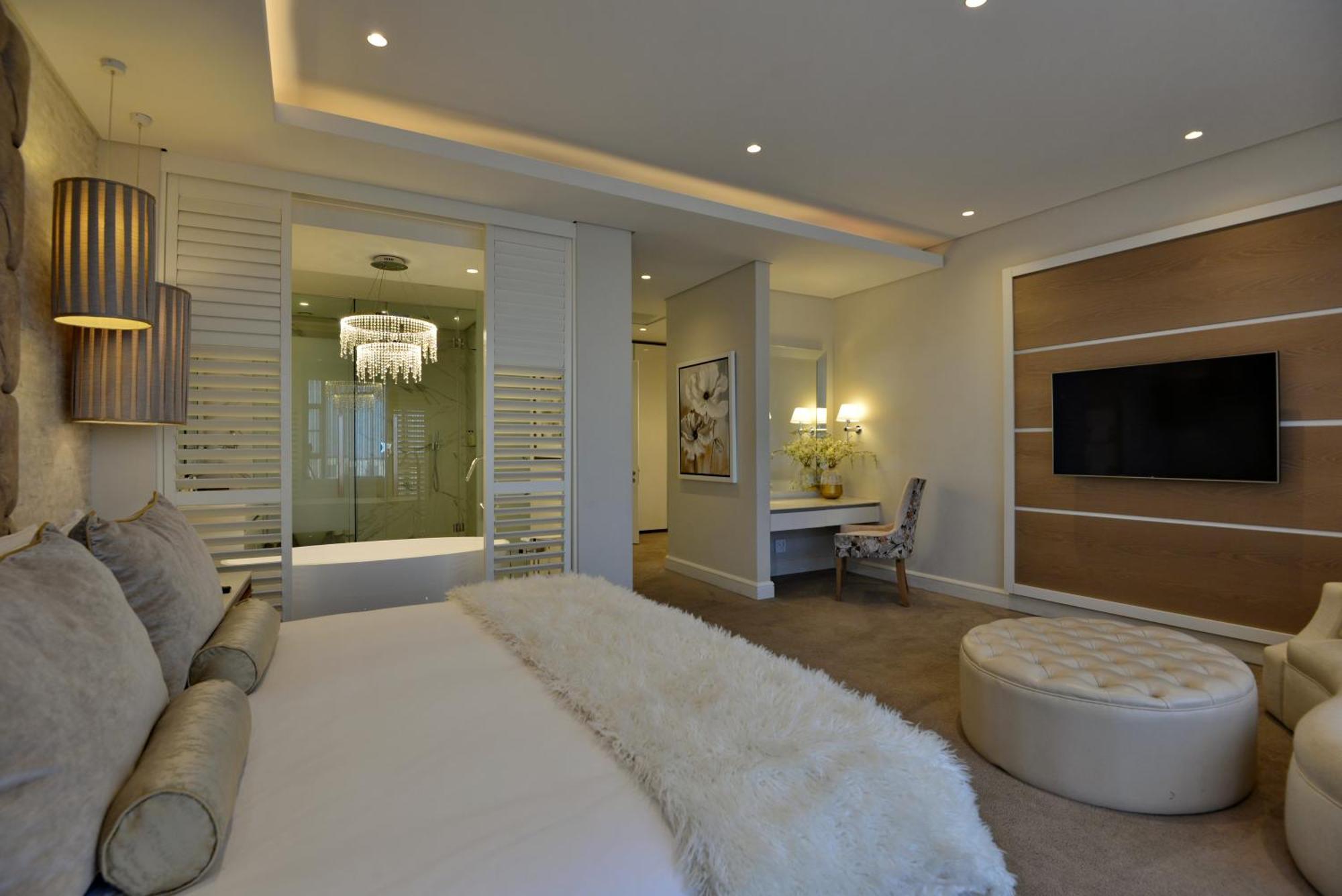 The Houghton Hotel, Spa, Wellness & Golf Joanesburgo Quarto foto A bedroom at The Ivy Hotel