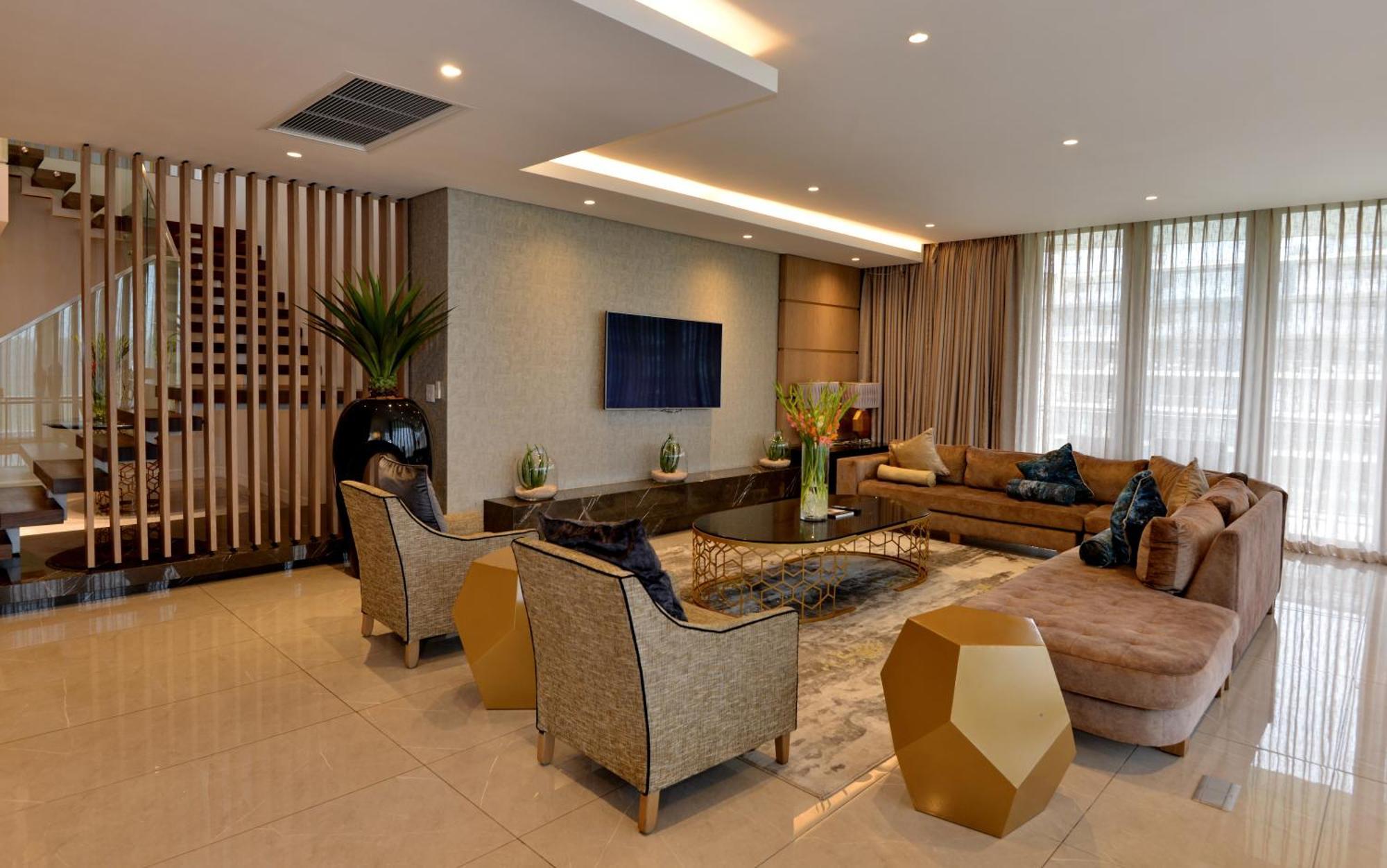 The Houghton Hotel, Spa, Wellness & Golf Joanesburgo Exterior foto A living room in a luxury apartment